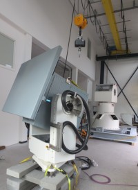 iIPSC-MSG: Pedestal for Navy Applications with RF Antenna (in the background of iMAR's tracker assembly area: azimuth/elevation gimbal for 1.8 tons antenna payload)